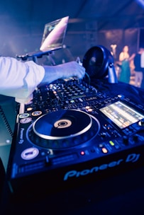 a person working on a dj turntable