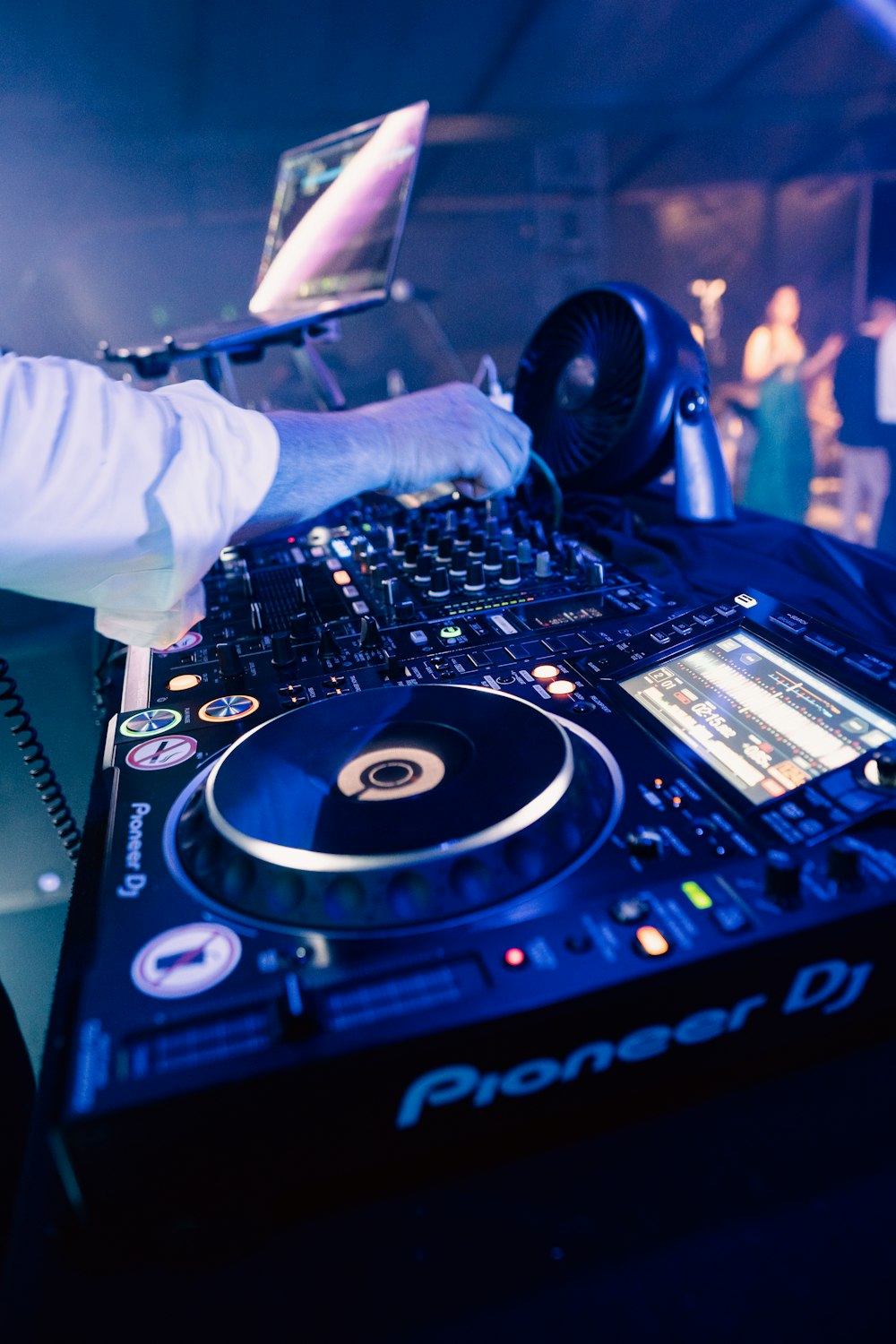 a person working on a dj turntable