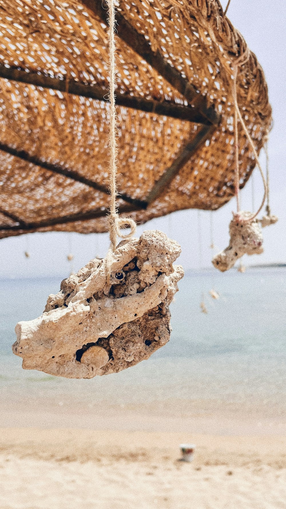 a piece of wood with a piece of wood stuck in it