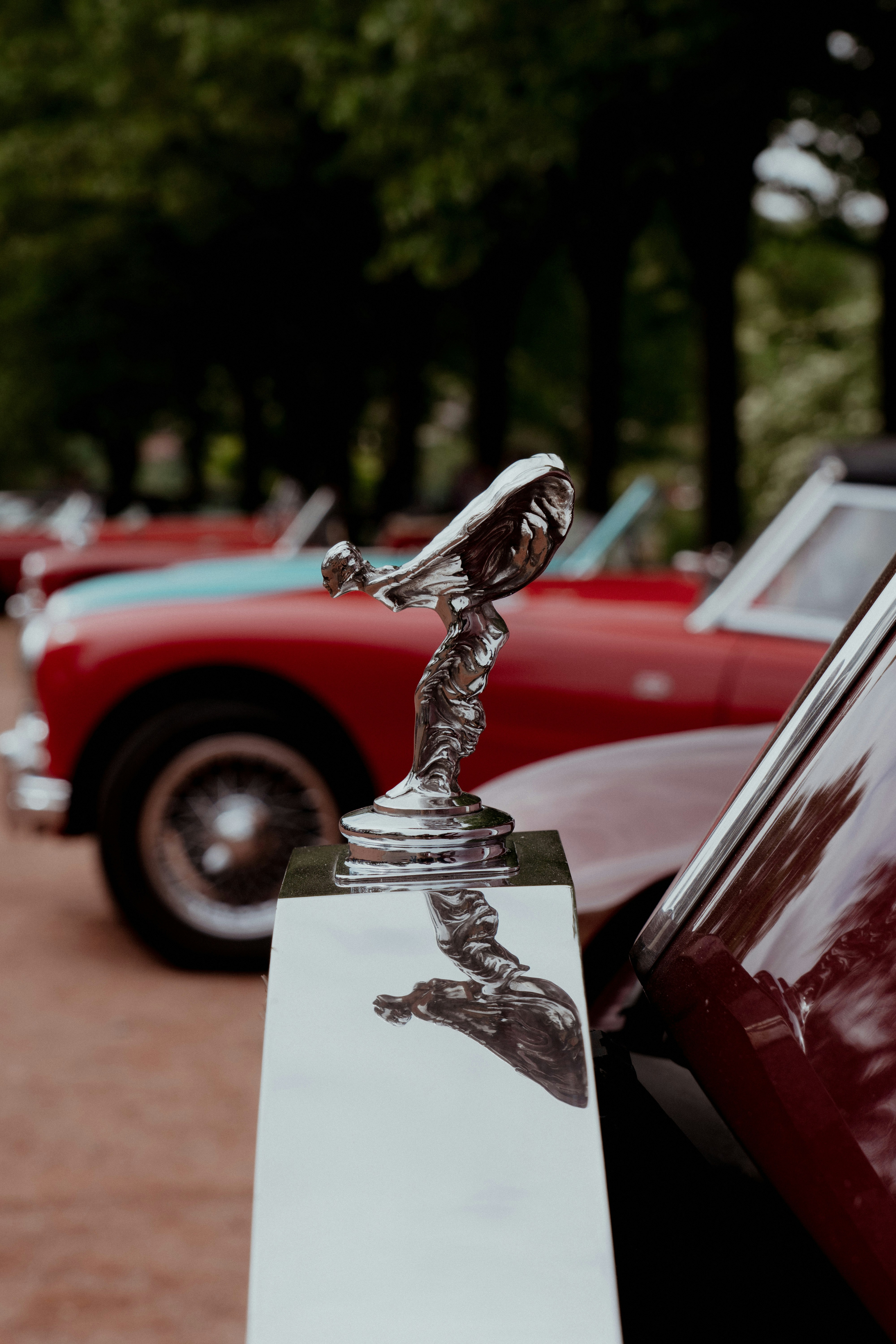 a metal object on a white post