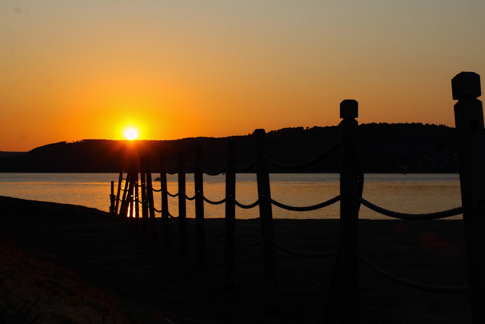 a sunset over a body of water