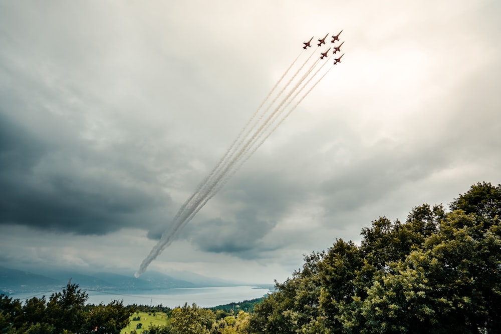 a group of jets flying in the sky