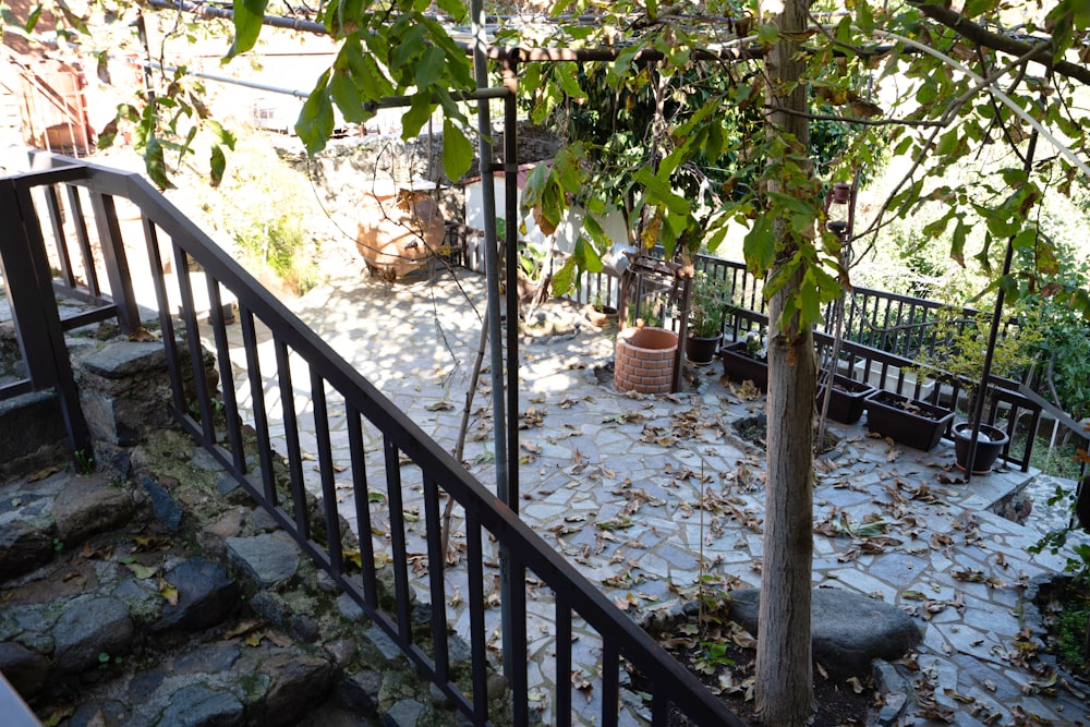 a stone staircase with a railing