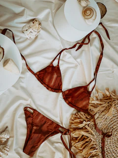 a white dress with a red bow