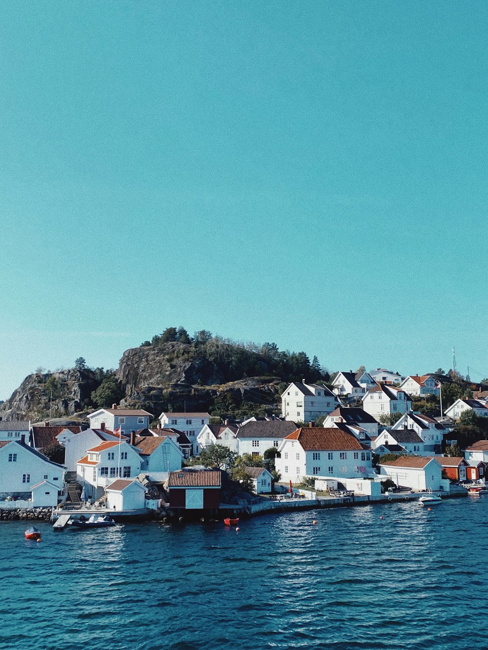 a group of houses on a hill