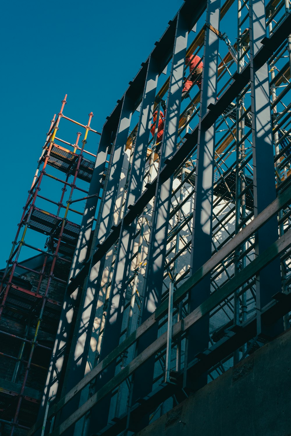 a tall building with a crane