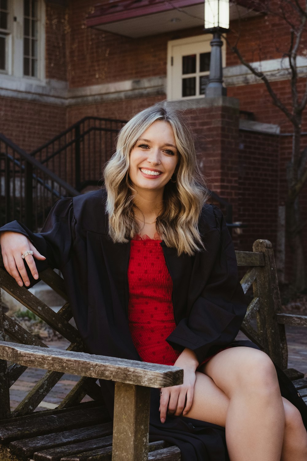 a woman sitting on a bench