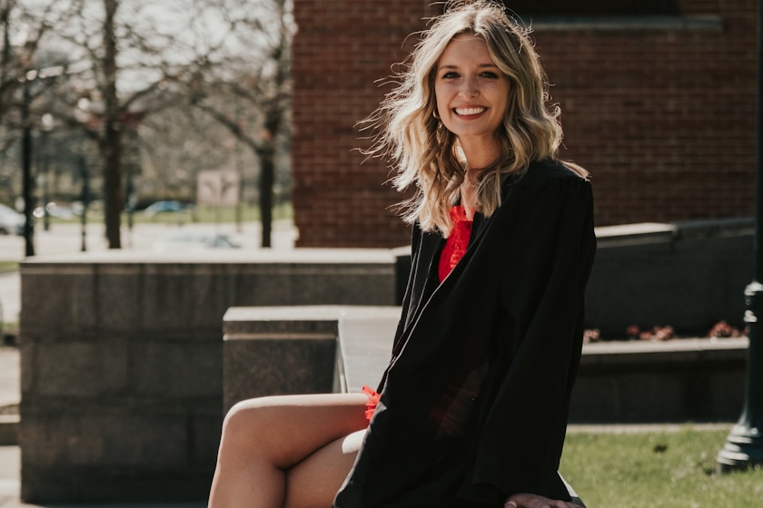 a woman sitting on a bench