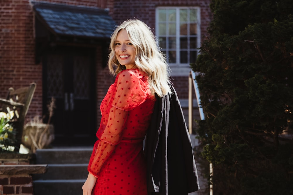 a woman in a red dress