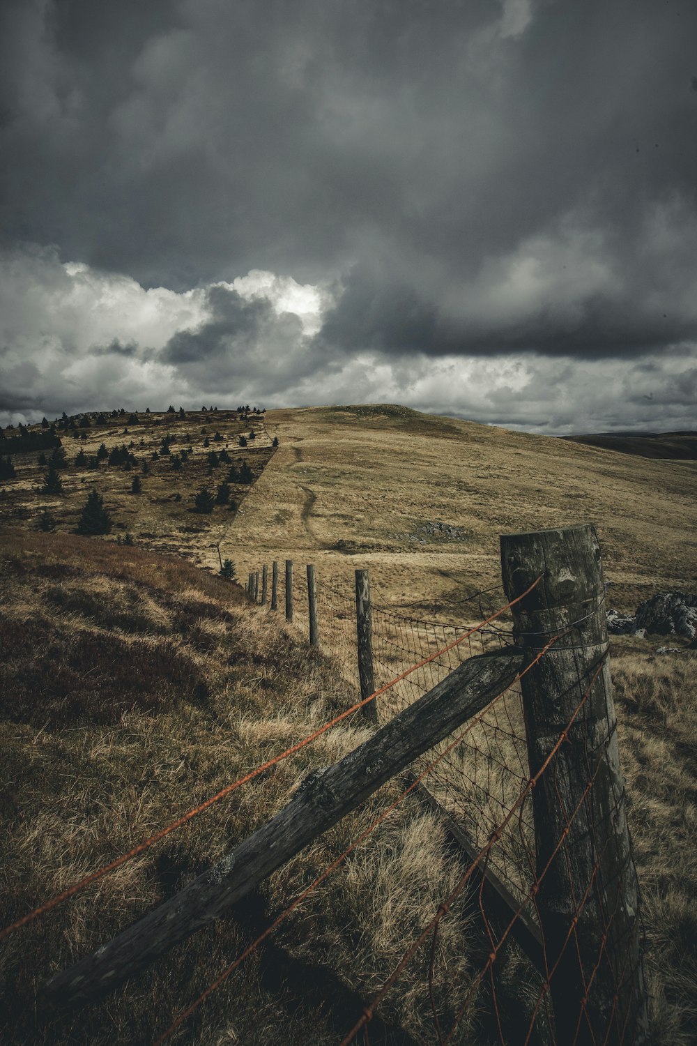 a fence on a hill