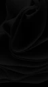 Abstract flowing black ribbons with soft shadows and smooth curves