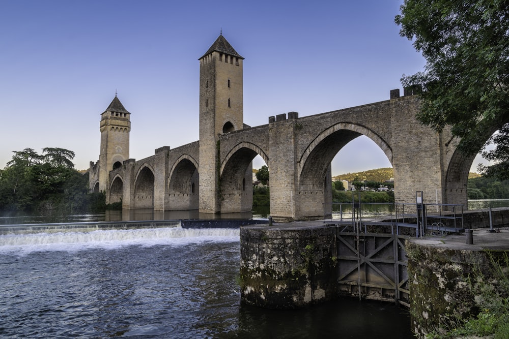 a stone bridge over water