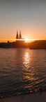 Sunset view over the Aguarico river with colorful sky reflecting on the water.