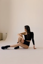 a woman sitting on the floor