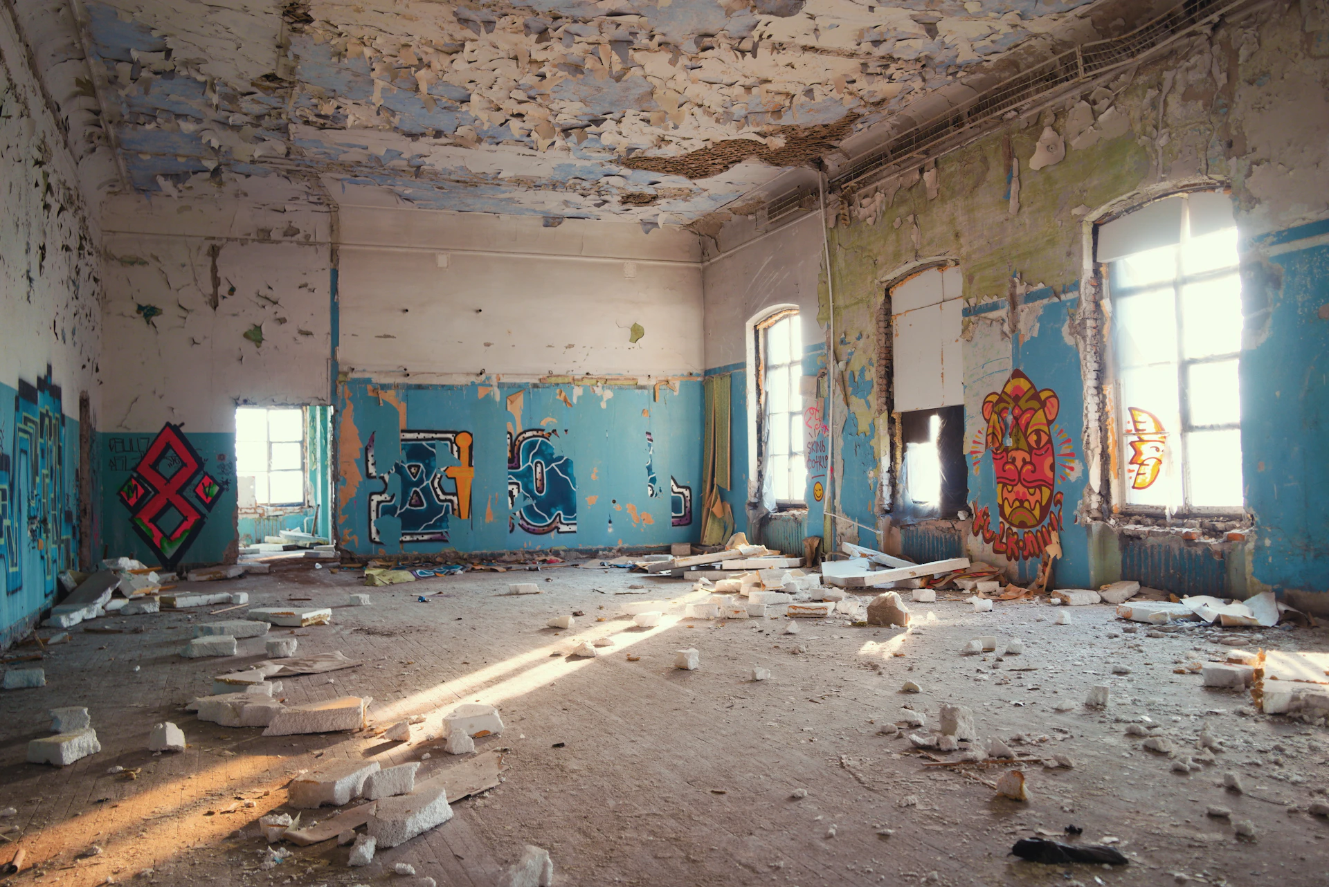 a room with graffiti on the walls