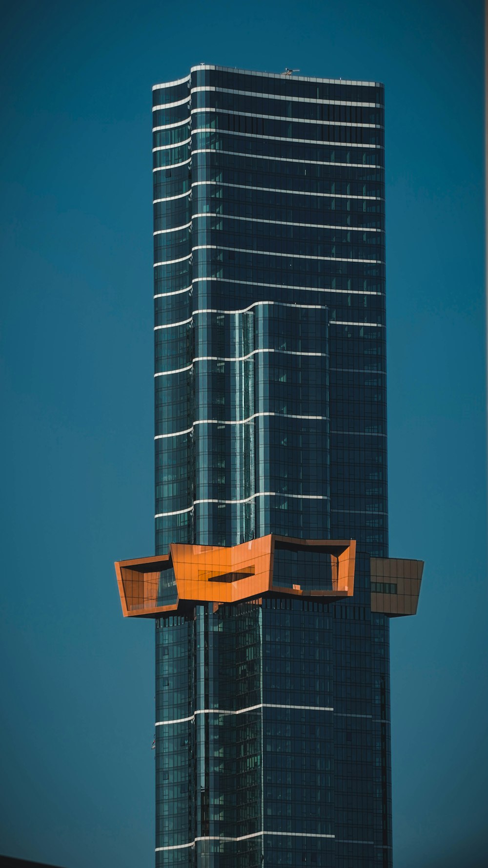 a tall building with a sign on it