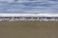 Close-up of the Sea Organ's pipes with waves gently flowing over them.