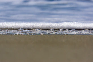 Close-up of the Sea Organ's pipes with waves gently flowing over them.