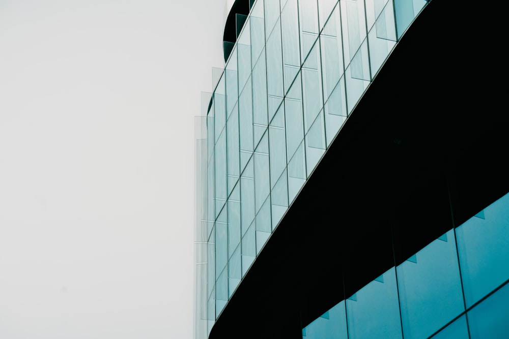 a tall building with glass walls