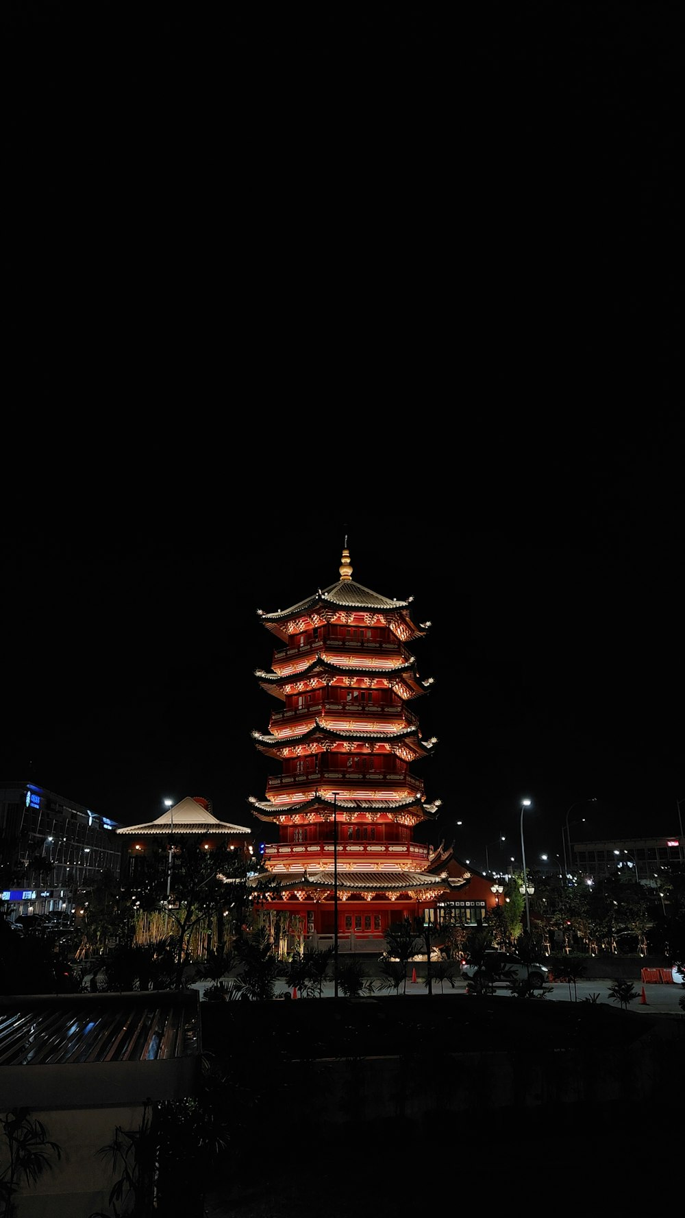 a tall pagoda in a city