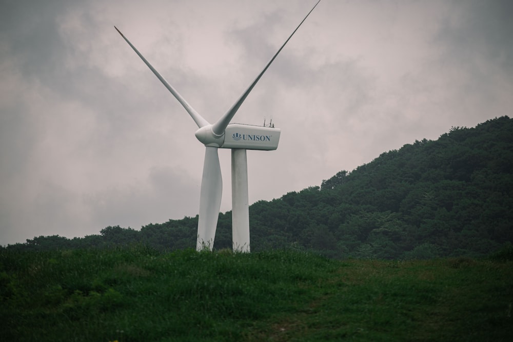 a windmill on a hill