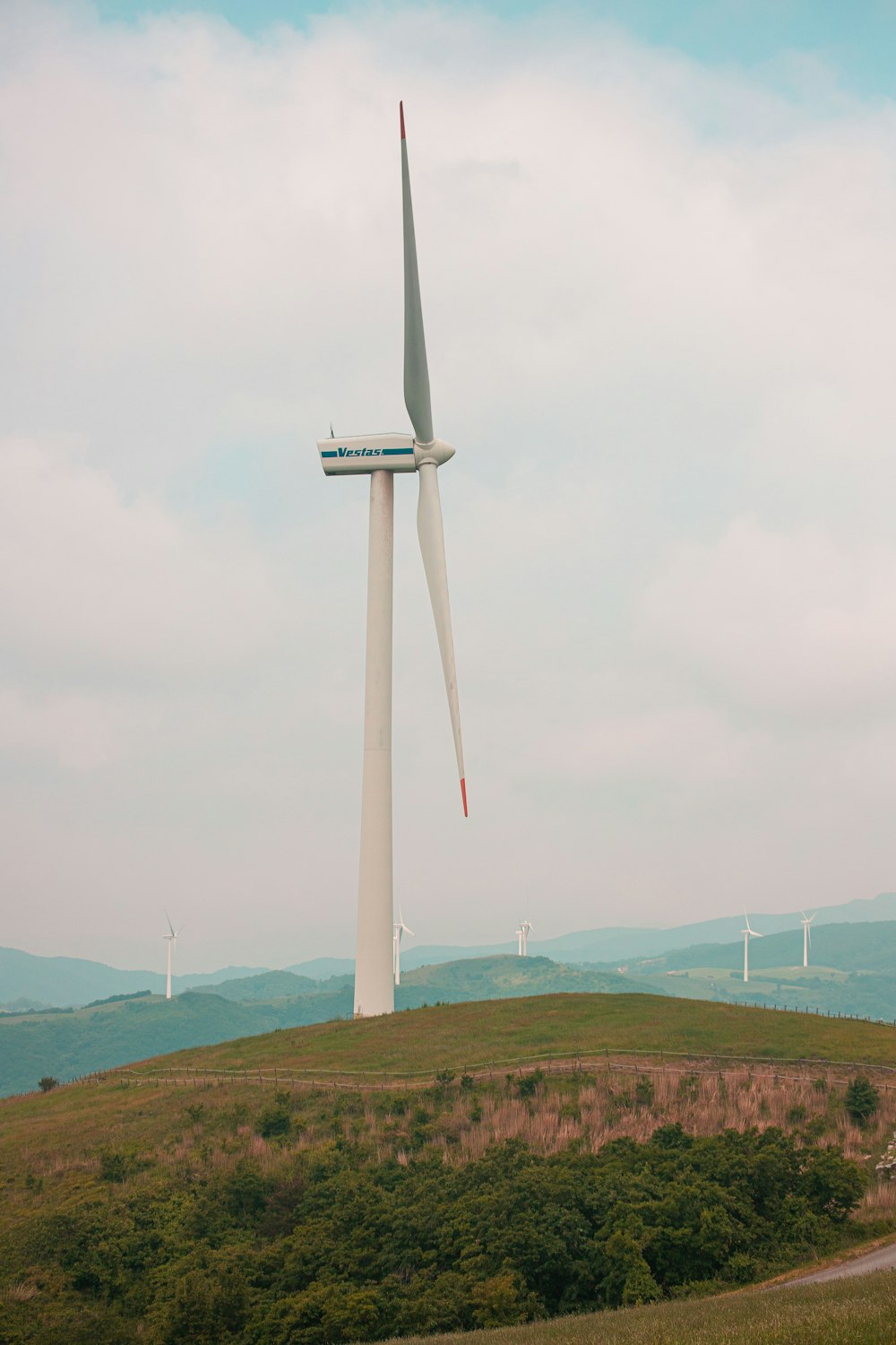 a tall white windmill