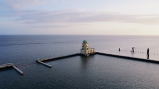 a lighthouse on a pier