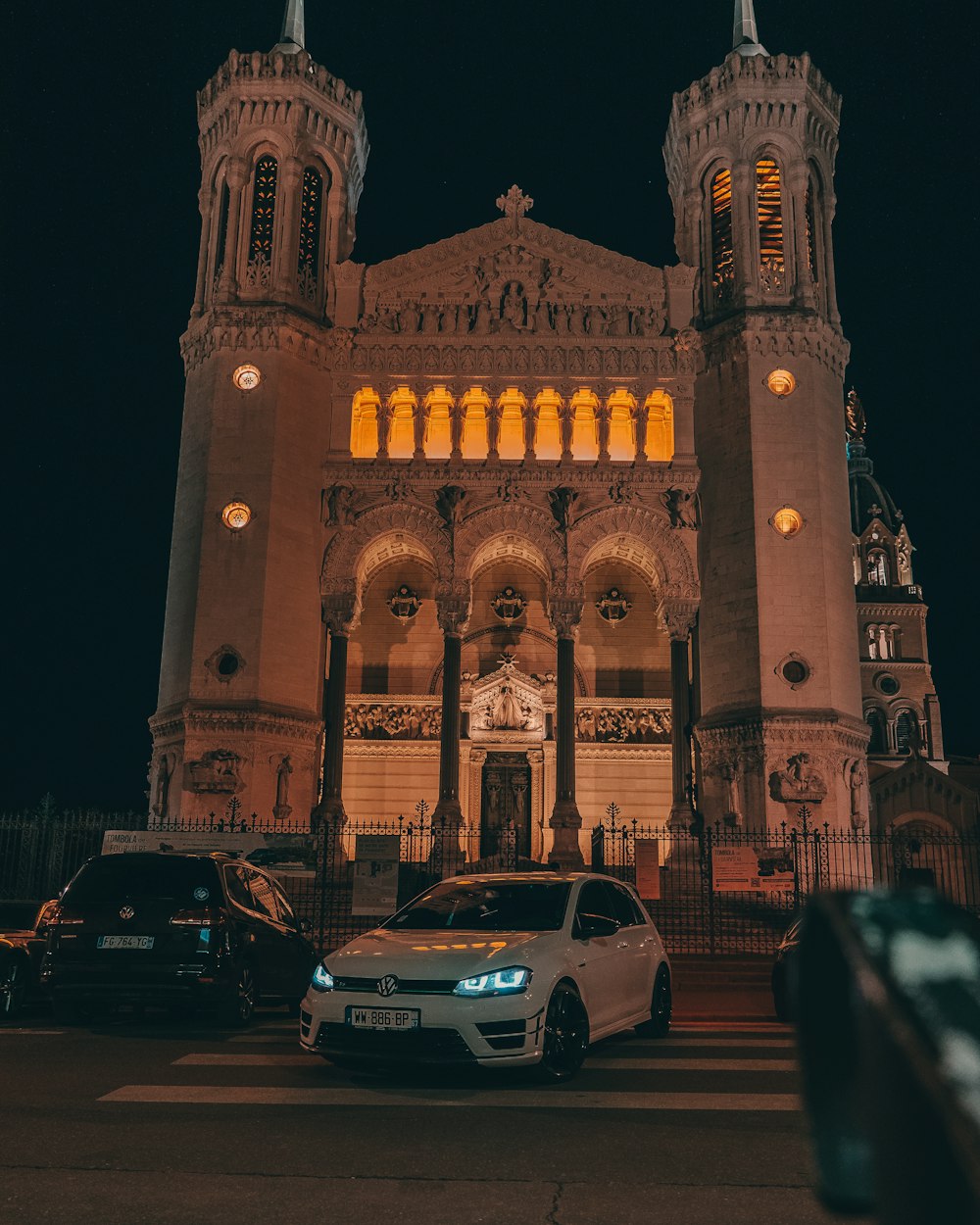 cars parked in front of a building