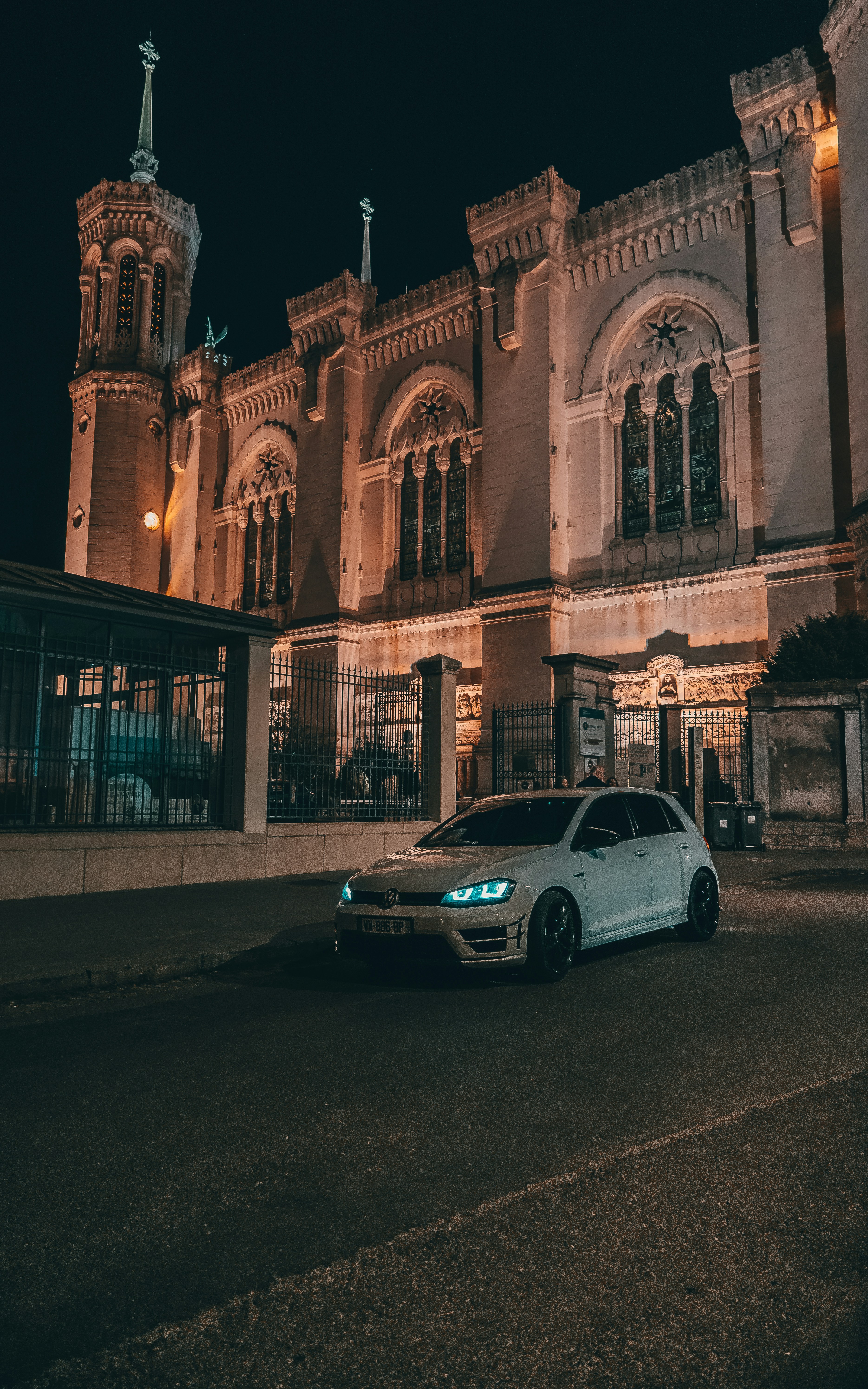 A car parked in front of a building photo – Free Fourvière Image on ...