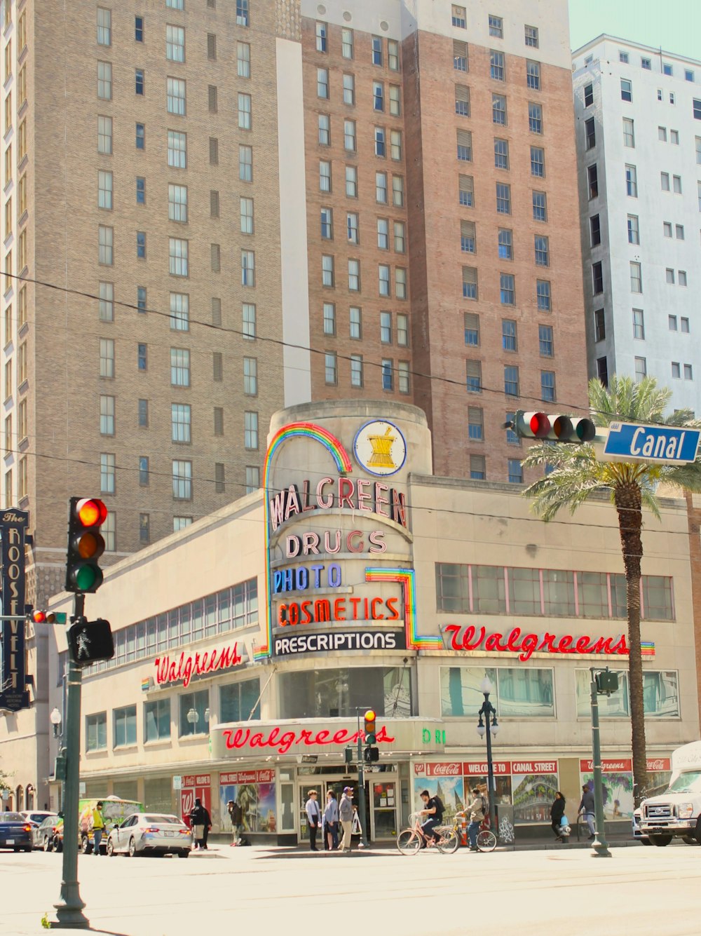 a large building towers over a city