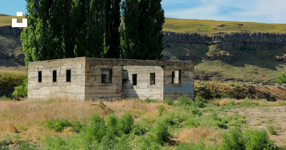 Building Ina Field A stone building in a field photo – Free Countryside Image on Unsplash