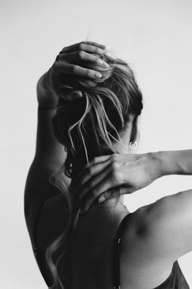 a woman getting her hair done
