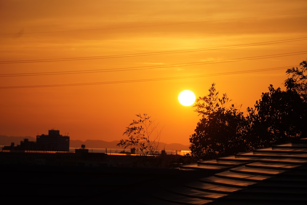 a sunset over a city