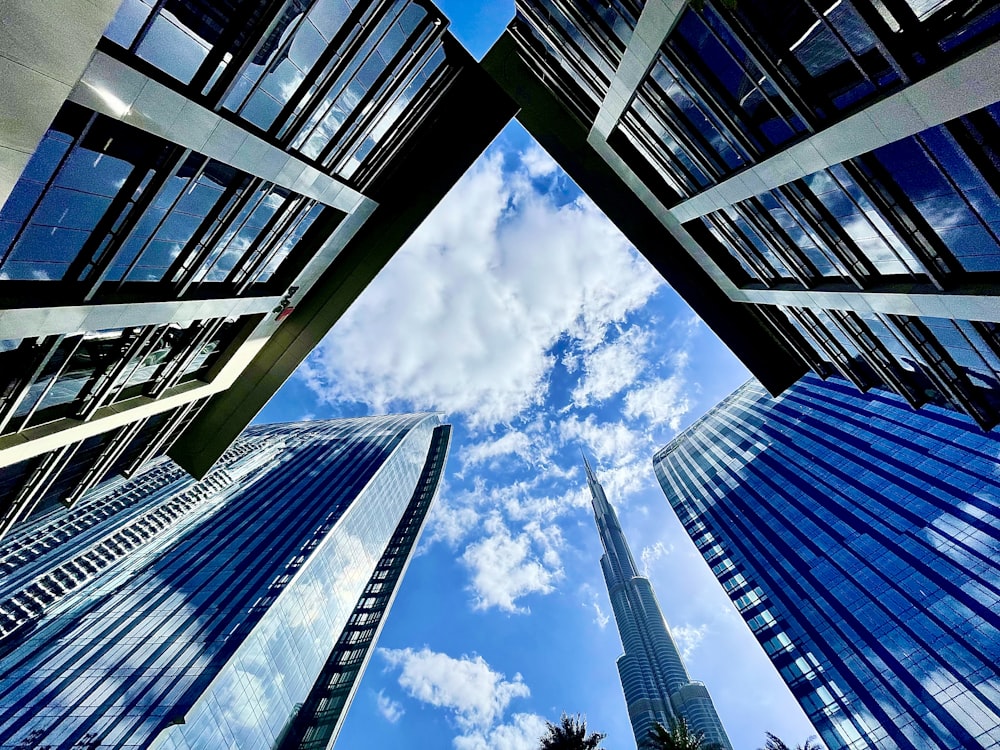 looking up at tall buildings