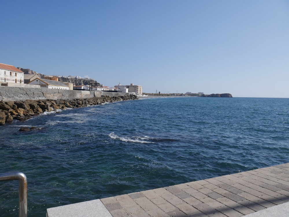 a body of water with buildings along it