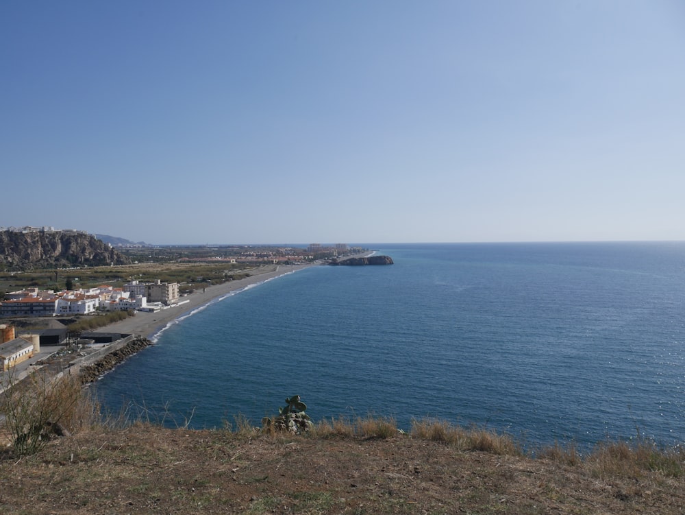 a body of water with buildings along it