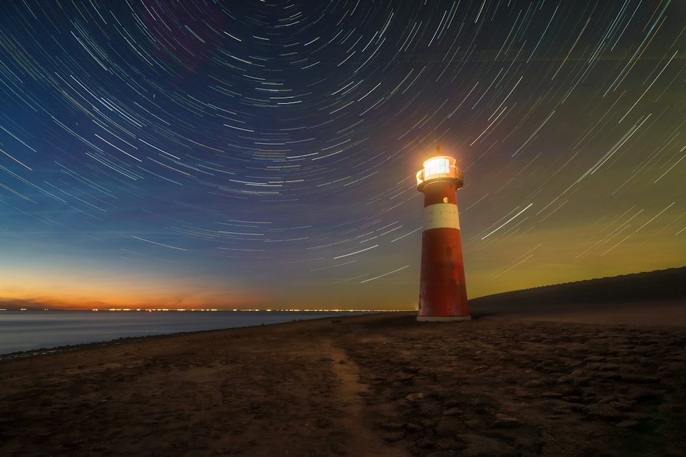 a lighthouse on a beach