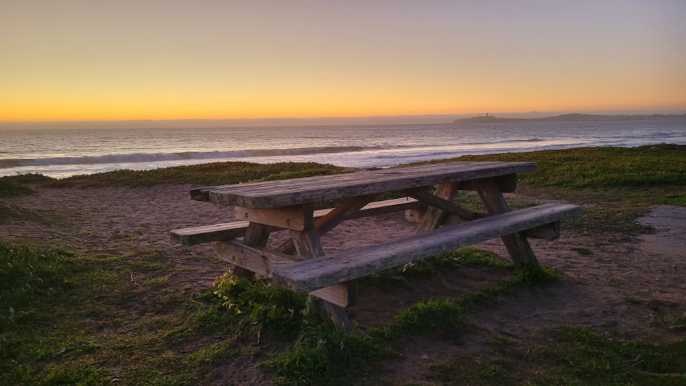 a picnic table on a beach