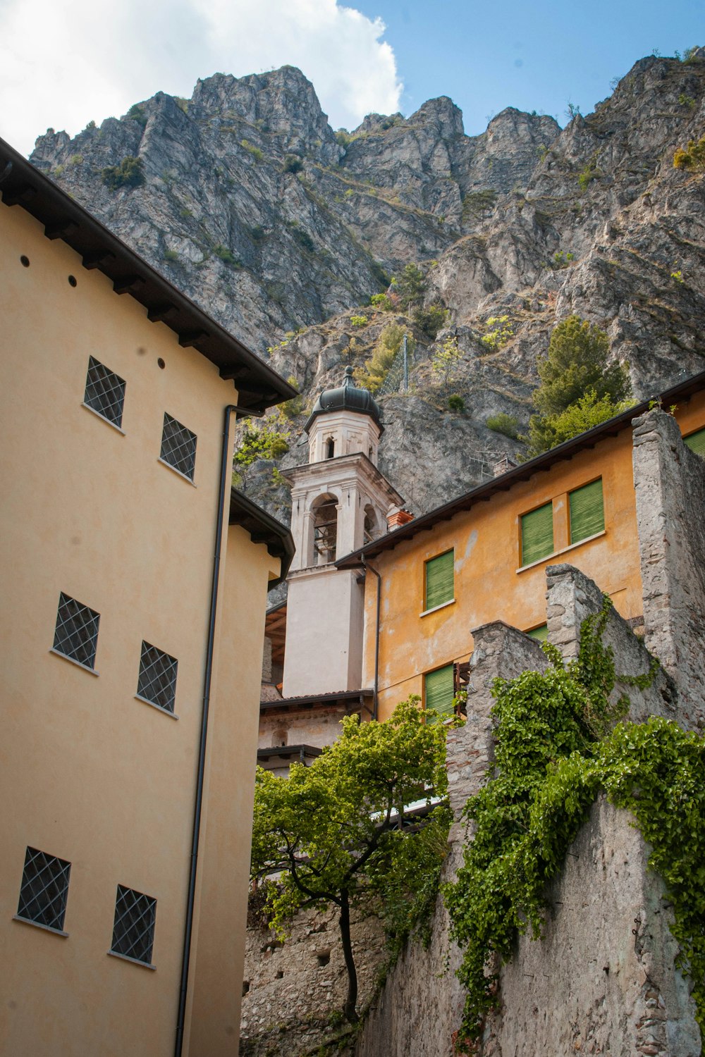 a building with a mountain in the background