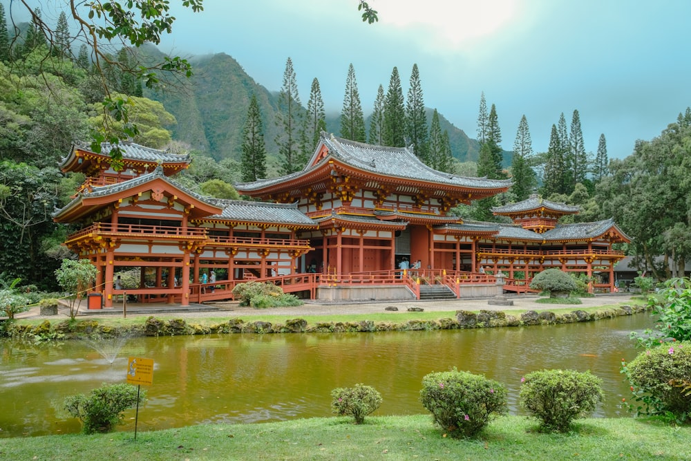 a building with a pond in front of it