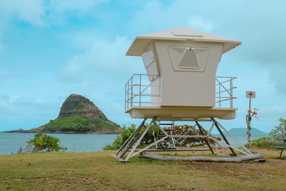 a structure outside by the water