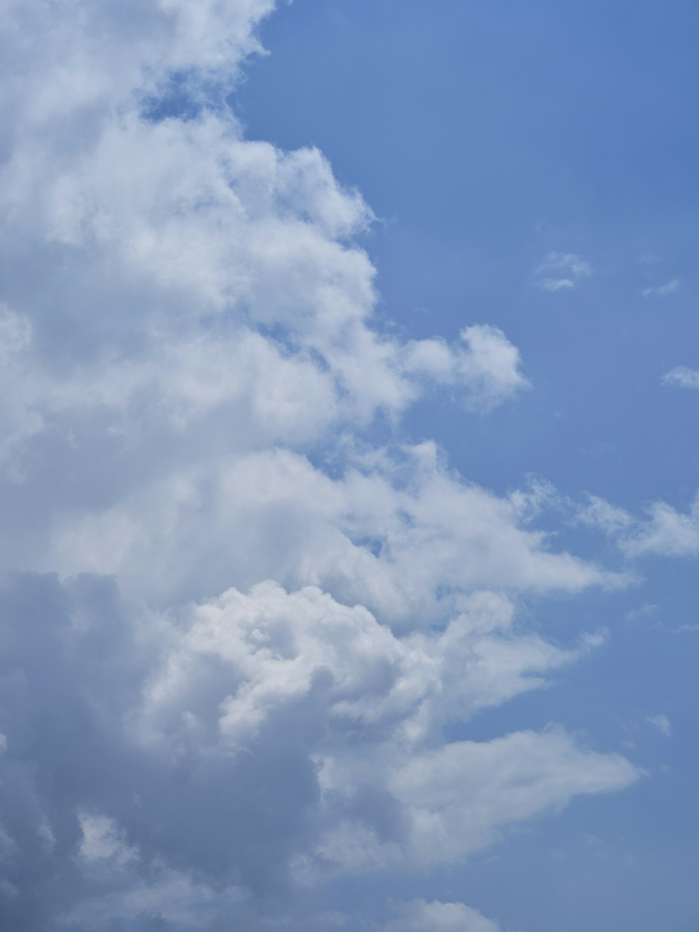 a blue sky with white clouds