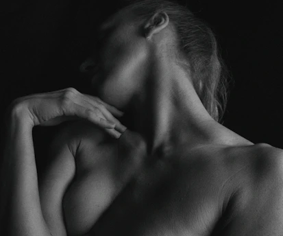 a person holding the head