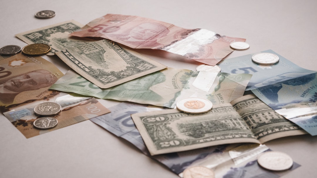 text, letter, Canadian and American Bills and Coins</p>
<p>