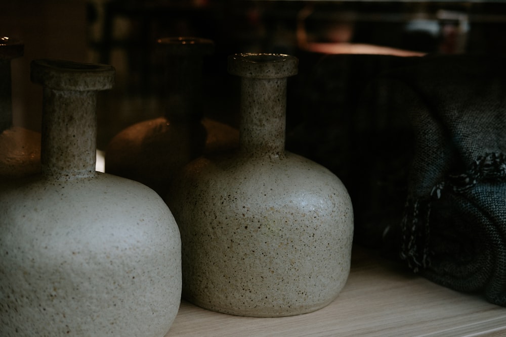 a couple of vases on a table