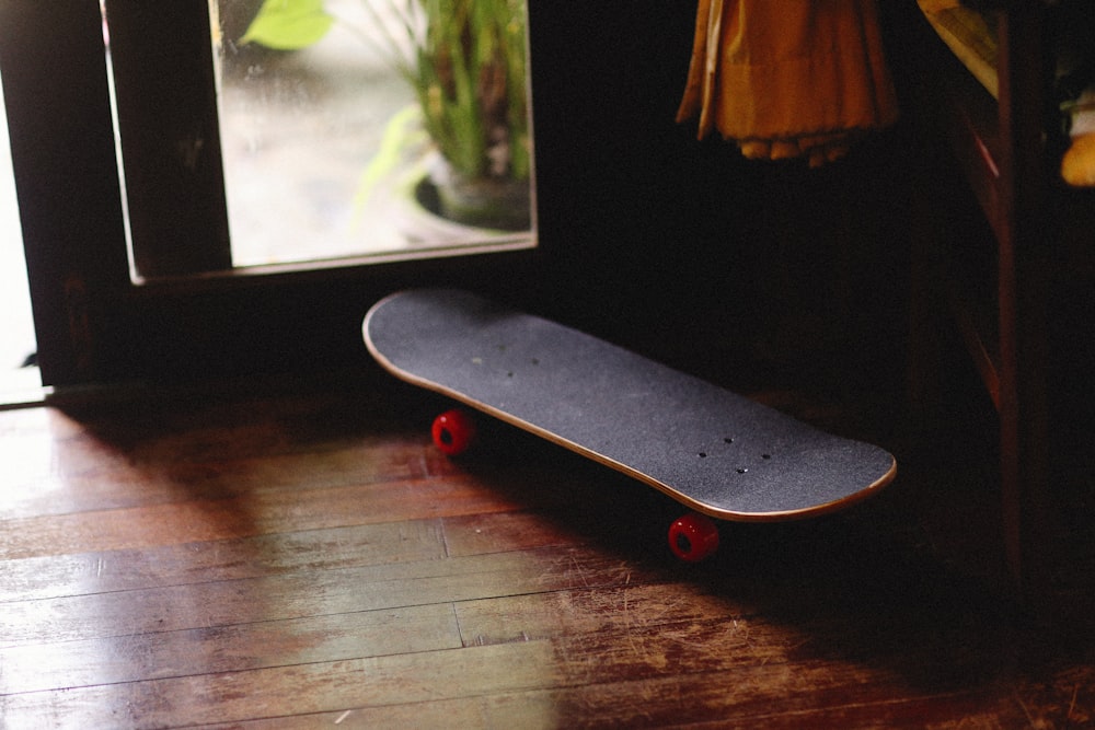 a skateboard on a wood floor