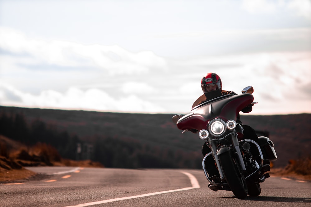 a person riding a motorcycle on a road