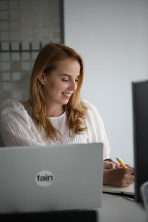 a woman using a laptop