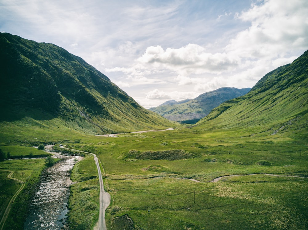 a stream running through a valley