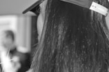 A close-up of a healthy scalp with thick hair.